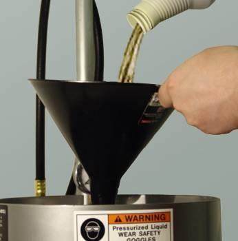 Insert a plastic funnel tightly into the filler port and fill with brake fluid (Fig. 4).