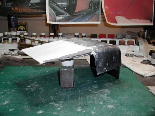 The white section that will cover the driver and front passenger has been custom fabricated out of 2mm styrene board. Building this roof assembly consisted of three individual steps.