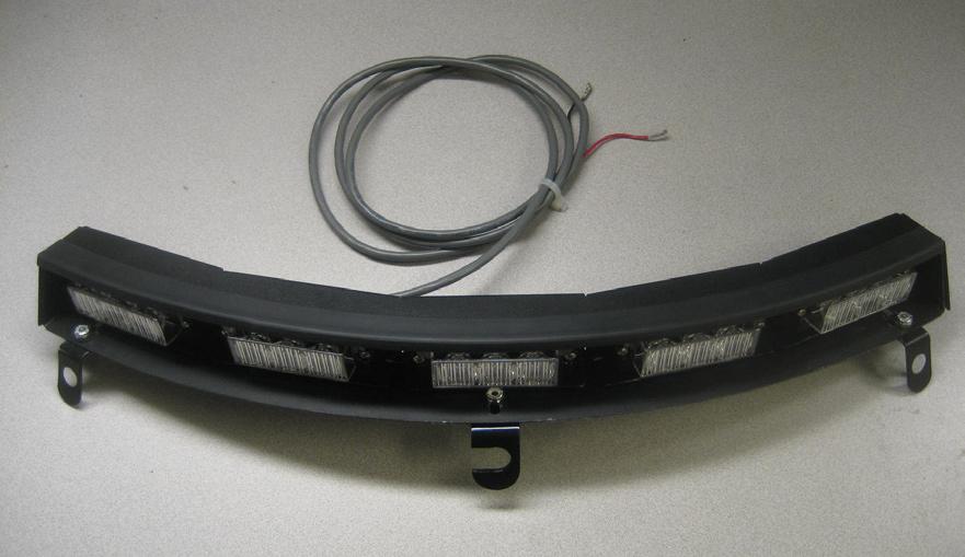 Place trim ring over front of LED light and fully seat against flange of LED assembly. 4.