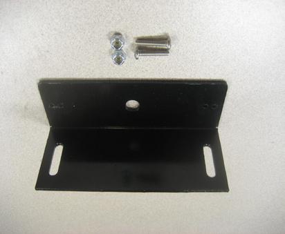 Black rubber grommets are between the U-shaped mounting bracket and the outside of the radio box. 3.