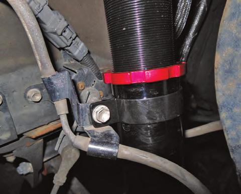 4. Reattach the spindle to the upper control arm ball joint (fig. 19).