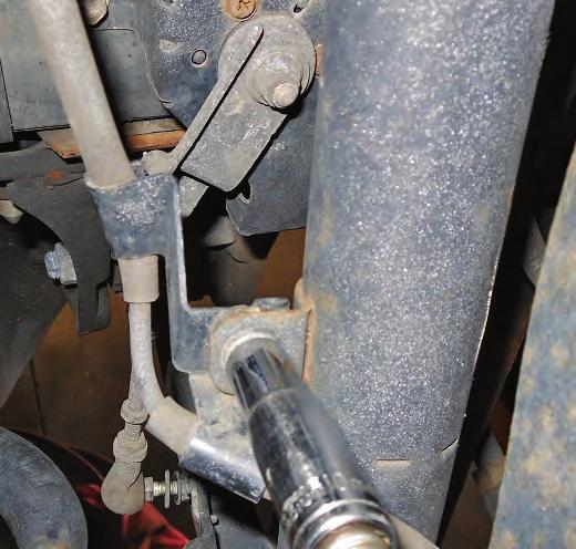 Remove the nut retaining the stabilizer bar end link