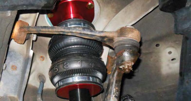 Install a new cotter pin through the ball joint nut. fig. 23 5.