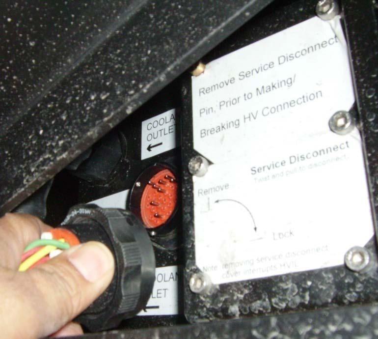 Vehicle Safety Figure 2: Removing Low Voltage Connector from High Voltage Battery Pack Remove the service disconnect cover from the front of the battery pack.