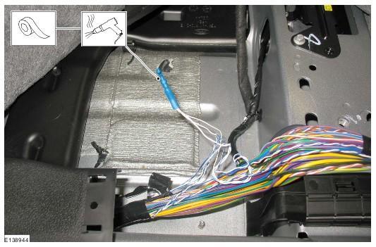 If required remove the insulation at the cable ends. Insert the twisted ends of the wires into the solder/heat shrink connector. CAUTION: Do NOT damage any surrounding wiring.