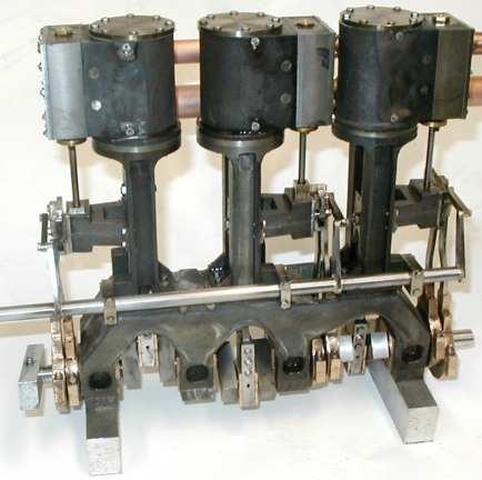 Side view of engine: Recall that the Shay engine on the right side of the locomotive. This photo show the outer side of the engine. The rod across the front controls the reversing of the engine.