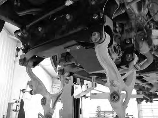 Install the new differential skid plate to the front crossmember with ½ x 1-1/4 bolts and ½ SAE washers (BP #660) into the welded nuts in the