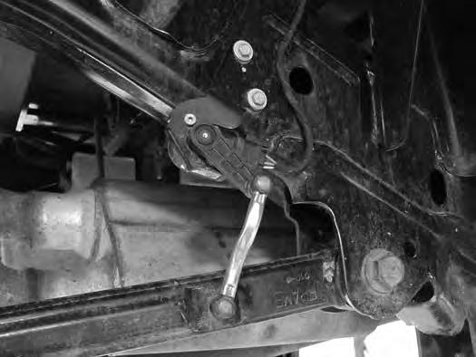 37). FIGURE 37 80. Disconnect the upper control arm from the axle.