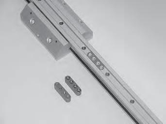 Aluminum roller guides Version with wipers Integrated into an additional cover, a felt wiper is saturated with oil.