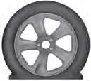 Inflate the tire to the pressure listed on the tire label located on the driver's door or the door jamb area.