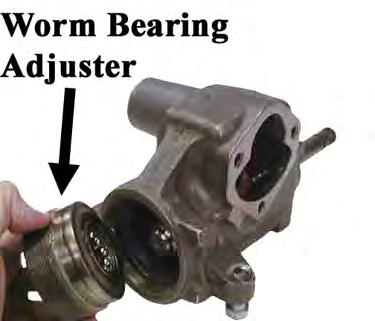 18: Insert each group of bearings into the ball guides. Note: Do not rotate the worm shaft while installing the bearings.
