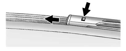 Vehicle Care 225 To remove the cover: 2. Press the square button on the top side, at the end of the wiper arm, and pull the wiper blade out of the end of the wiper arm. 3.