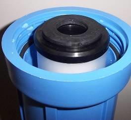 6. Discard used DI cartridge and insert new DI cartridge into tall filter housing. DI Cartridge O-ring Filter Housing 7. Apply silicone grease to the o-ring. 8.