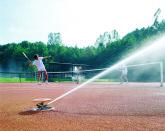Courts can be irrigated and moistened using Perrot pop-up sprinklers with fullly