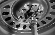 Loosen the cable by turning the wheel wrench counterclockwise three or four turns. 4. Repeat this procedure at least two times.