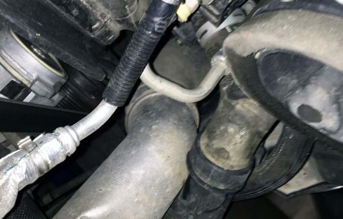 STEP 4 Disconnect and remove the factory exhaust crossover tube and remove the exhaust valve from the