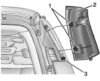 Vehicle Care 10-37 3. Carefully disconnect the push pins (1) from the applique bracket. 4. Remove the third nut (3) from the upper outboard side of the lamp. 5.