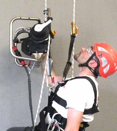 PowerSeat PWRS-B.Compact Fall Arrest Device Lower Front Attachment to PowerSea 7. Connect the snap-hook supplied with the device to the lower front attachment point of the harness.