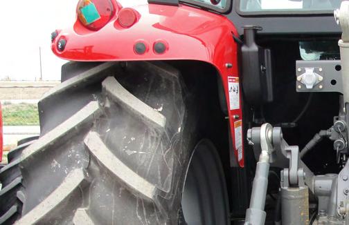 Keep hands and feet from under the units and clear of pinch points between the tractor hitch arms and implement pins.