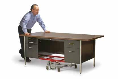 Simply roll Mighty King desk lift beneath desk, depress handle and elevate desk. In seconds desk can be rolled in any direction. SAVE TIME. LABOR.