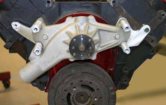 Install the (4) 8 x " mounting studs (S9) into the four water pump mounting holes 1 2" inch deep into block. Remove all pulleys and water pump.