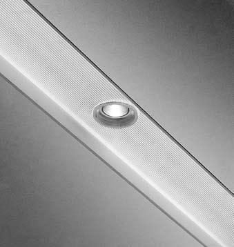 Trimless accent lights float within the lens. Metal Halide accent light provides energy efficient crisp accent lighting. Available with clear frosted or ribbed acrylic lens.