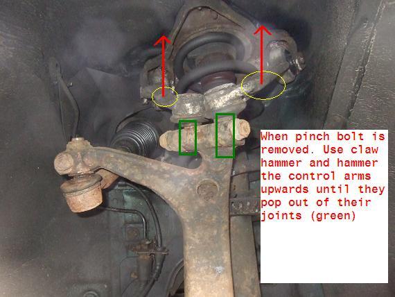 Step 7 Once you have removed the pinch bolt and nuts, use the hammer and tap control arms to remove the ball joints.