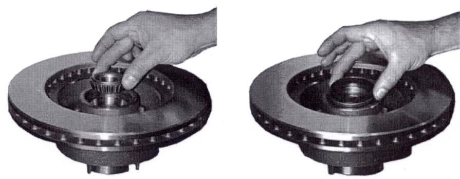 Figure 4 13. Now install the inner bearing (the larger bearing) and bearing seal into the rotor as shown below. Carefully tap the bearing seal into place securely with a small hammer or large socket.