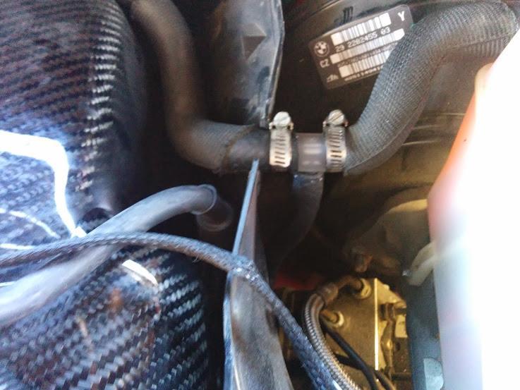 I have absolutely no idea why BMW decided to locate an electronic sensor on the top of a motor to be exposed to high heat. The only requirement is for the sensor to face a certain way.
