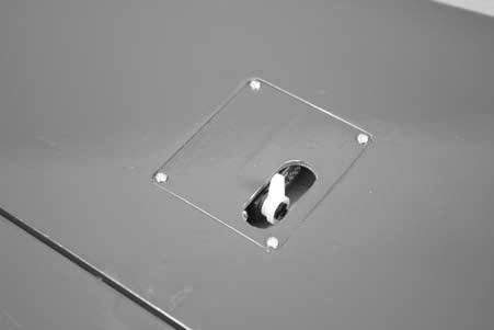 12. Secure the aileron servo cover using the four 2mm x 12mm sheet metal screws remove in step 1