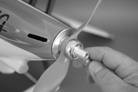 Make sure the opening in the spinner cone does not contact the propeller.