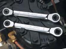 60612 7" heavy-duty reversible ratchet wrench with hex openings 1/2" and 9/16" at one end; square 3/16" and 1/4" at other end.