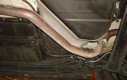 Taking all under car safety precautions, lift the vehicle using a hoist or hydraulic lift. Once this has been done, you may begin the removal of your old exhaust system from your vehicle.
