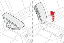 F For access to the open storage box below the armrest, lift the complete armrest towards the rear.