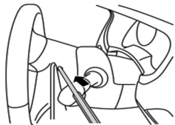 A Fig. 23 20) Removing airbag module assembly. a) Locate the retaining spring access hole (A) in the steering wheel rear finisher, as shown and insert a suitable 5.