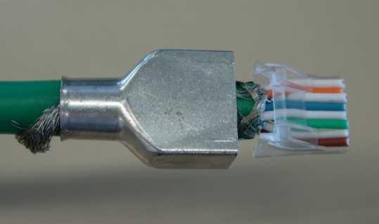 Insert the front of the wire holder into the plug housing cavity Figure 9 7.