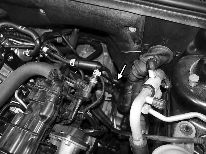 20) On the left rear of the engine next to the transmission, reconnect the electrical connection