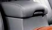 Front Armrest/Center Console Storage Box To access the bottom storage bin, pull up on the driver s side lever 1. To access the top storage bin, pull up on the passenger s side lever 2.