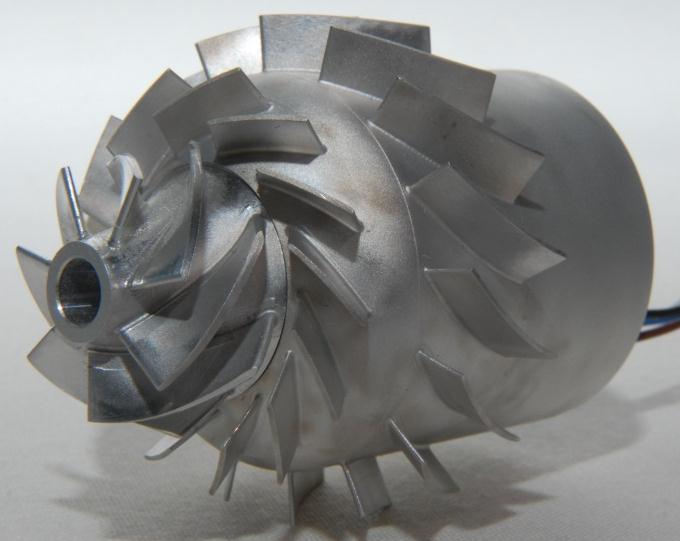 Pressure ratio (-) Isentropic efficiency (%) Figure : Impeller geometries determined for rotational speeds of 100,000, 150,000 and 00,000 rpm, showing meridional velocity contours from Vista TF