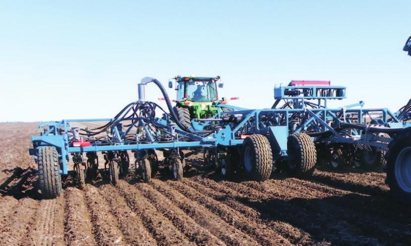 specialised direct drill - pivoting arm planter assembly A pivoting arm frame on the planter assembly gives adequate independent planter assembly control without the added expense of extra pivots