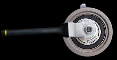 8) Loosen the tensioner nut 9) Turn the mounting plate in a clockwise direction using the double hook wrench and