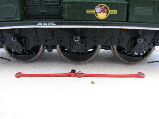 2. Next the coupling rods can be removed by undoing the crankpin screws with fine nose pliers.