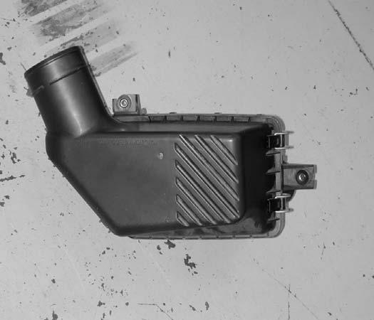 Remove the air inlet tube by sliding it off the throttle body and pulling it off the air filter housing.