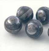 Balls larger than 1 inch are produced from bar stock and cut to the proper size and pressed between cold forming dies.
