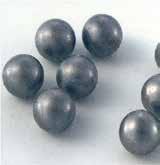 The excess material is normally removed by rough grinding before the balls can be processed further.
