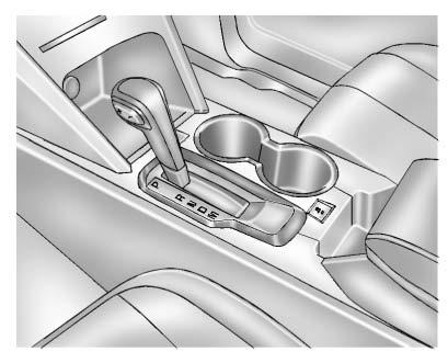 9-34 Driving and Operating Automatic Transmission The automatic transmission shift lever is located on the console between the seats. P (Park): This position locks the front wheels.
