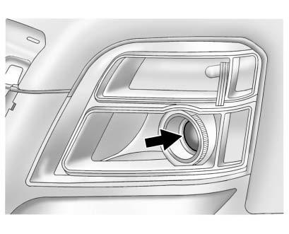 10-32 Vehicle Care To adjust the vertical aim, do the following: 1. Open the hood. See Hood on page 10 5 for more information. 2. Locate the aim dot on the lens of the low beam headlamp. 3.