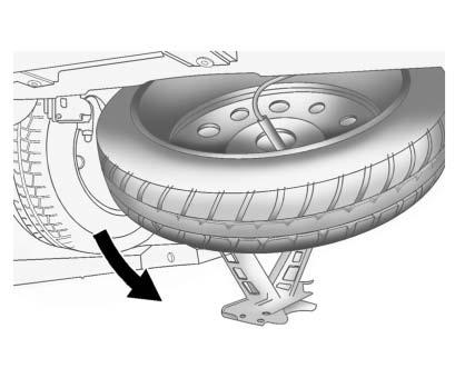 Vehicle Care 10-83 5. Turn the lug wrench clockwise to raise the jack until it lifts the secondary latch spring. 6.