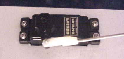 Locate the servo positions in the rear of the fuse and remove the covering with a sharp hobby blade. 17.