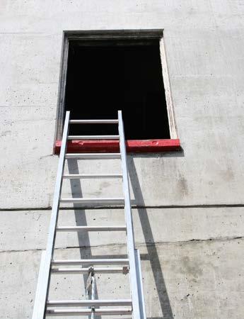 For Entering a Window 1. Place the tip of the ladder one to two rungs in the window, if space allows.
